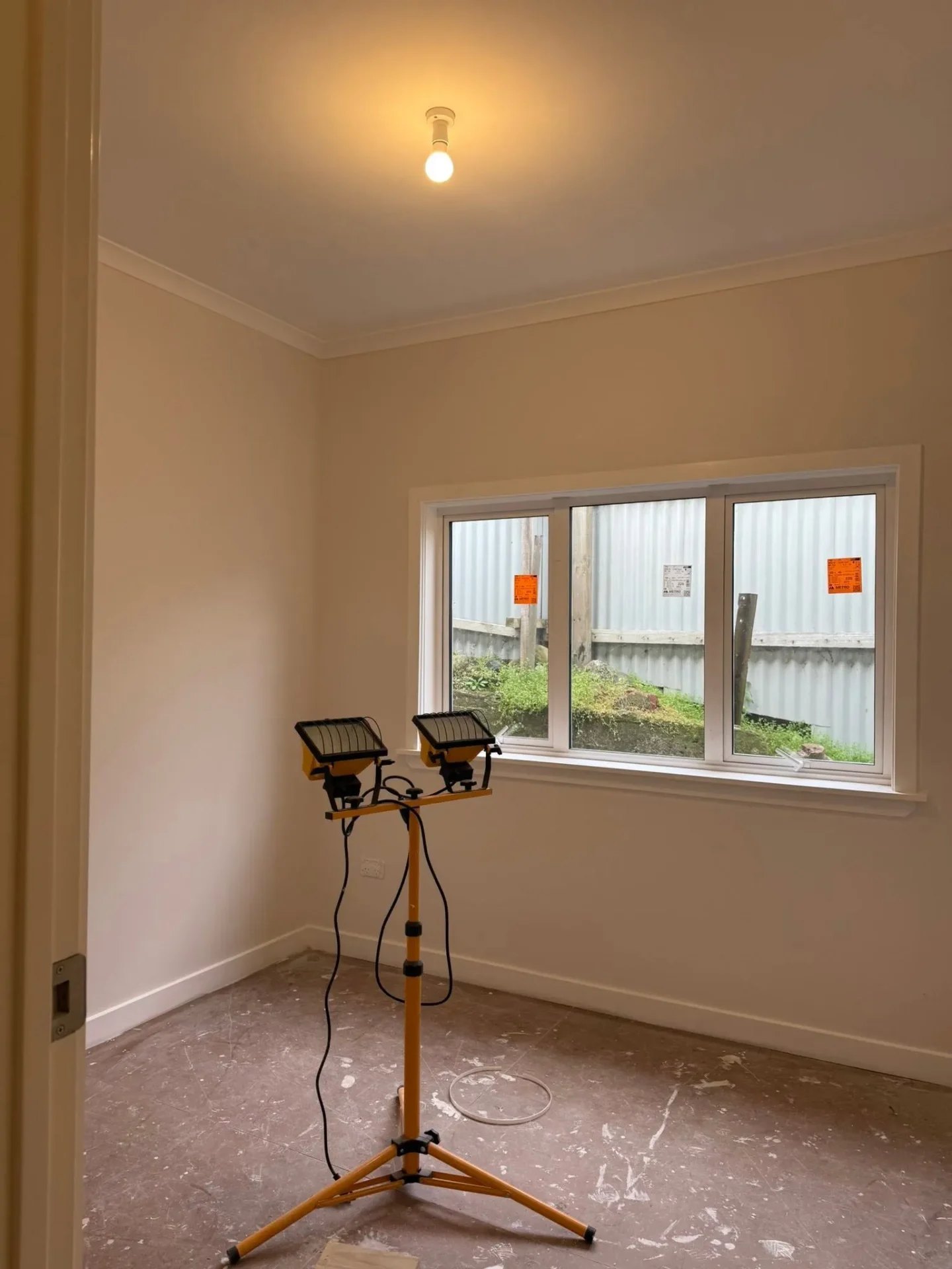 Newly painted room interior with clean trims and ceiling